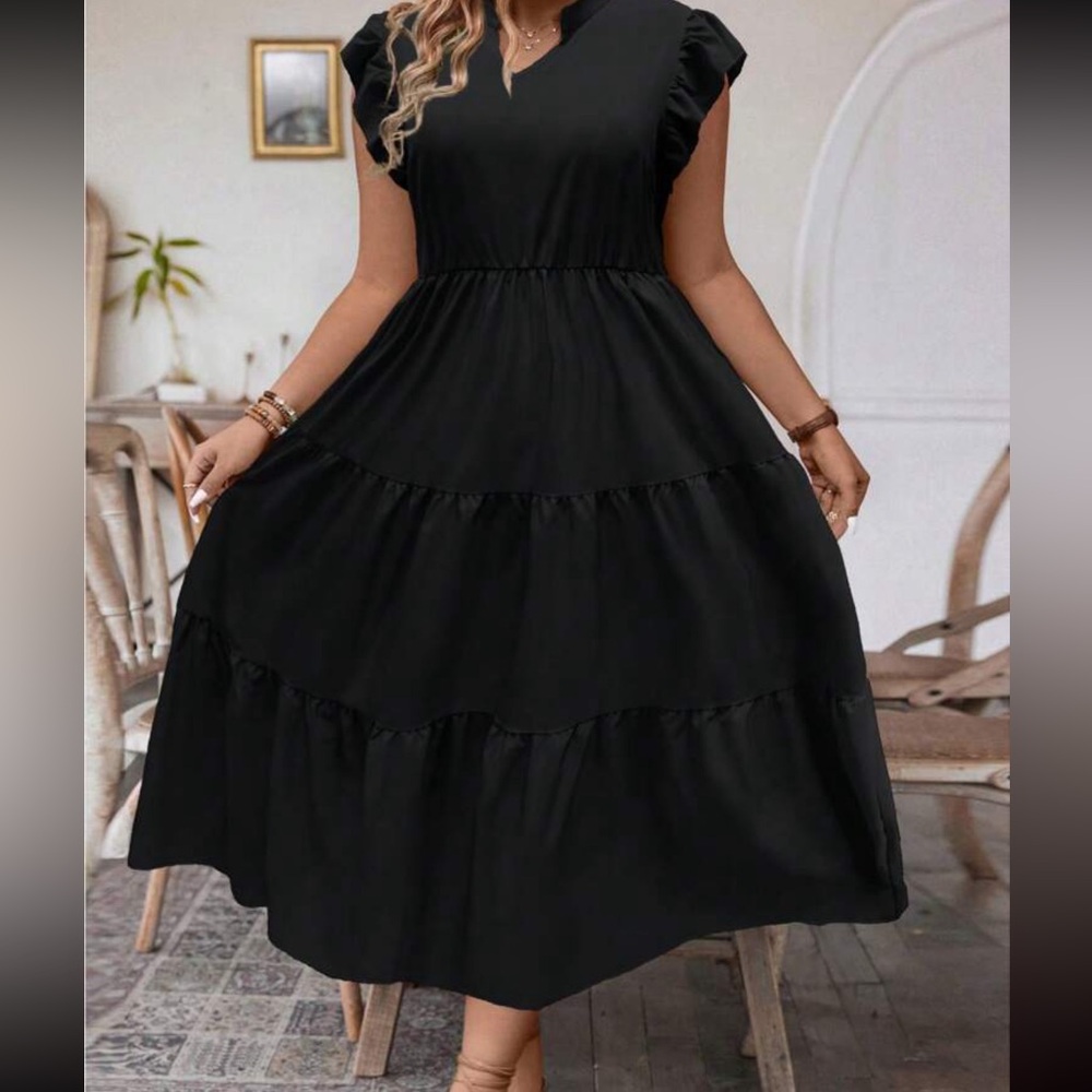 Ruffled sleeved dress